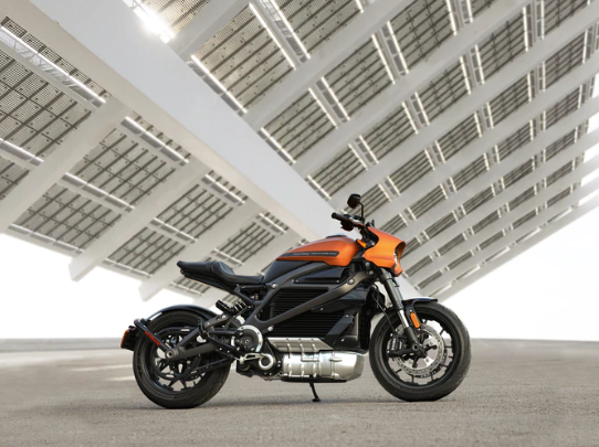 black and orange motorcycle photน